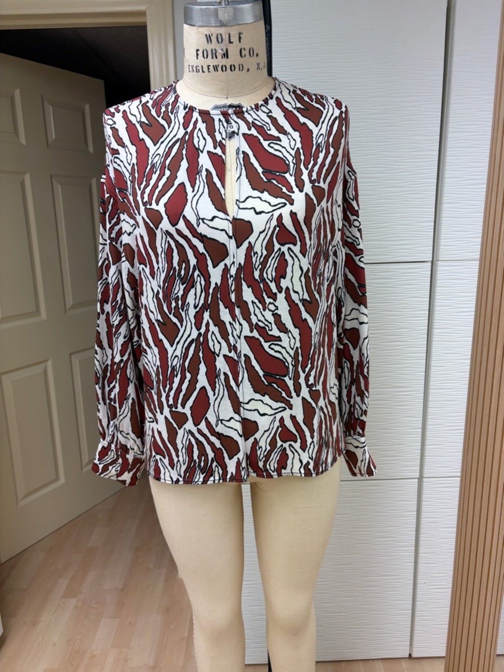 Womens Brown, Rust & White Printed Keyhole Blouse with CB zipper at back.